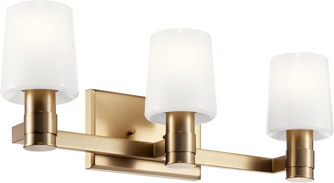 Kichler Adani 3-Light Bathroom Vanity Light, Champagne Bronze | Modern vanity light with opal glass for bathrooms and powder rooms (24" x 8.25"), 55176CPZ