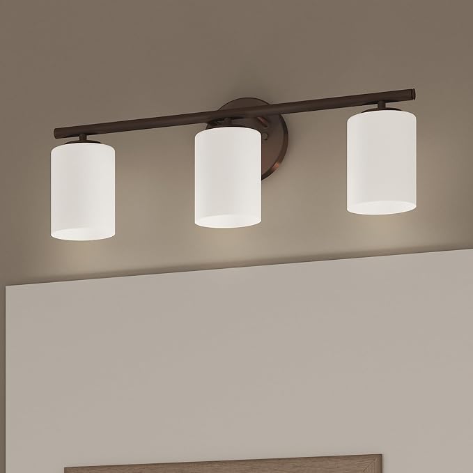 Progress Lighting Replay Collection 3 Light Bathroom Vanity Light, Modern Bath Lighting Fixture with Etched White Glass Shades for Over the Mirror, Reversible Mounting, Antique Bronze