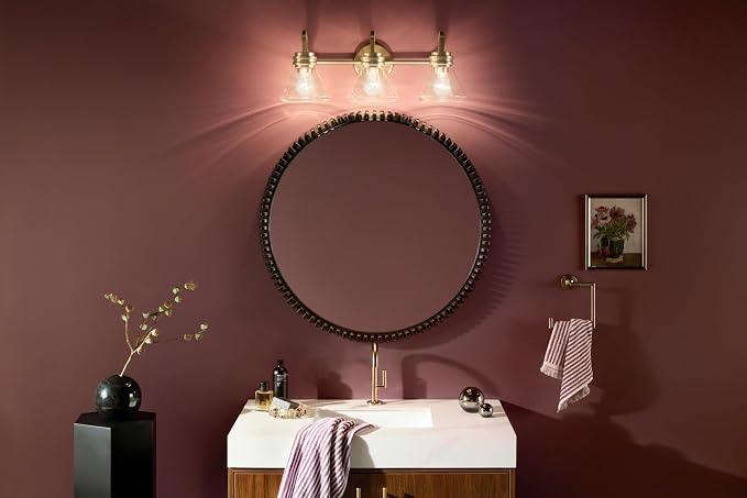 Kichler Farum 3-Light Bathroom Vanity Light, Champagne Bronze | Modern vanity light with clear glass for bathroom mirrors (26" x 9.5"), 55155CPZCLR