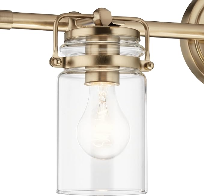 Kichler, Brinley 24" 3 Light Vanity Light with Clear Glass in Champagne Bronze for Bathroom and Powder Room, (24" W x 10.25" H), 45689CPZ