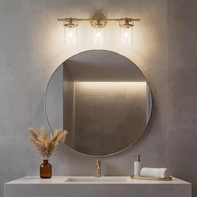 Kichler, Brinley 24" 3 Light Vanity Light with Clear Glass in Champagne Bronze for Bathroom and Powder Room, (24" W x 10.25" H), 45689CPZ