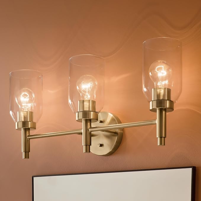 Kichler Madden 3-Light Bathroom Vanity Light, Champagne Bronze | Modern vanity light with clear glass for single bathroom mirrors (24" x 10.5"), 55185CPZ