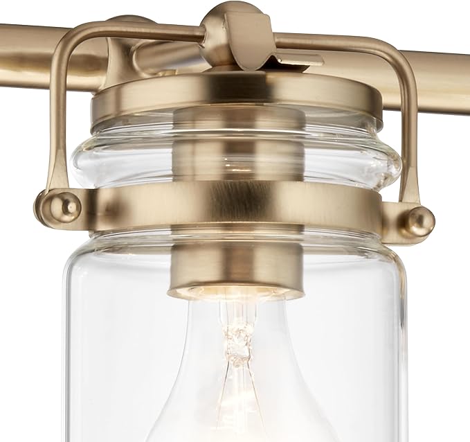 Kichler, Brinley 24" 3 Light Vanity Light with Clear Glass in Champagne Bronze for Bathroom and Powder Room, (24" W x 10.25" H), 45689CPZ