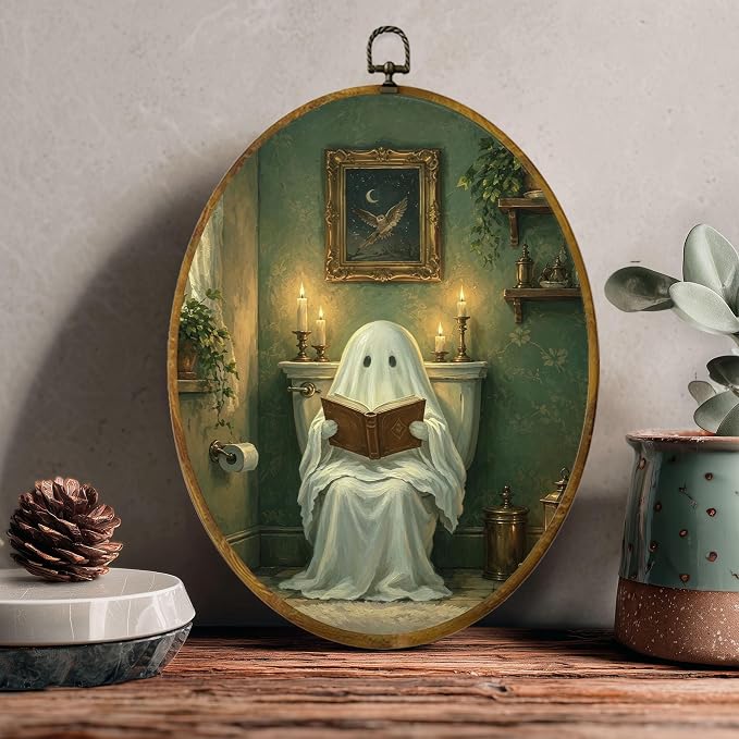 Reading Ghost Oval Wall Art, Framed Canvas Decor, 8.5x11.5 Inch | Reading ghost in vintage bathroom, candlelight, gothic cottagecore Halloween decor