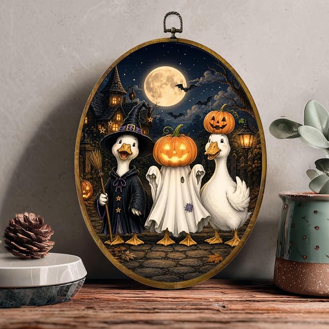 Halloween Duck Oval Wall Art, Framed Canvas Decor, 8.5x11.5 Inch | Halloween ducks in witch and pumpkin costumes, full moon haunted house decor