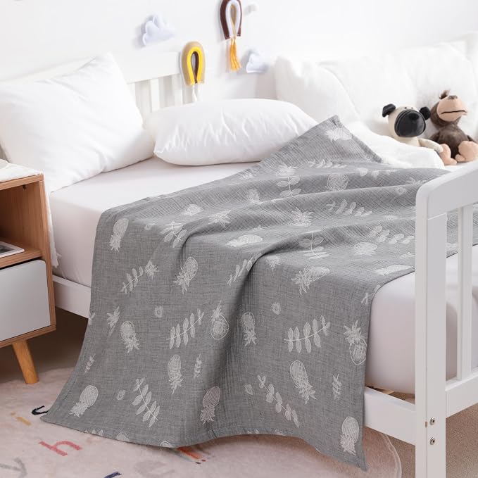 NTBAY 3 Layer Oversized Muslin Toddler Blanket, 45 x 60, Grey Pineapple | Muslin Cotton Outer Layers with Light Thermal Fiber Fill, Reversible Blanket for Daycare, Travel, Naps, and Supervised Use