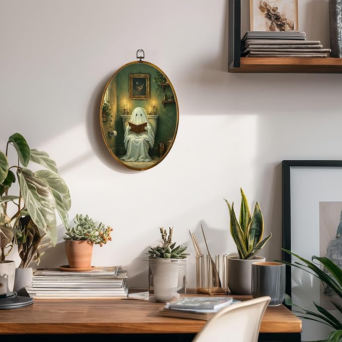 Reading Ghost Oval Wall Art, Framed Canvas Decor, 8.5x11.5 Inch | Reading ghost in vintage bathroom, candlelight, gothic cottagecore Halloween decor