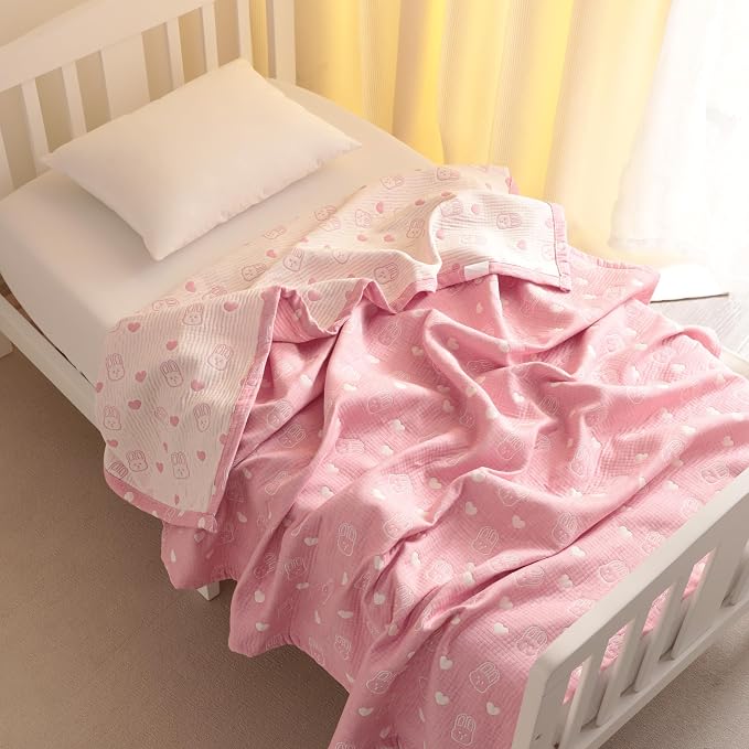 NTBAY 3 Layer Muslin Toddler Blanket, 30 x 40, Pink Rabbit | Breathable Muslin Cotton Outer Layers with Light Thermal Fill, Reversible for Stroller, Daycare, Travel, and Supervised Use