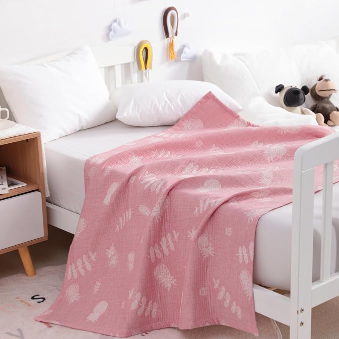 NTBAY 3 Layer Muslin Toddler Blanket, 30 x 40, Pink Pineapple | Breathable Muslin Cotton Outer Layers with Light Thermal Fill, Reversible for Stroller, Daycare, Travel, and Supervised Use